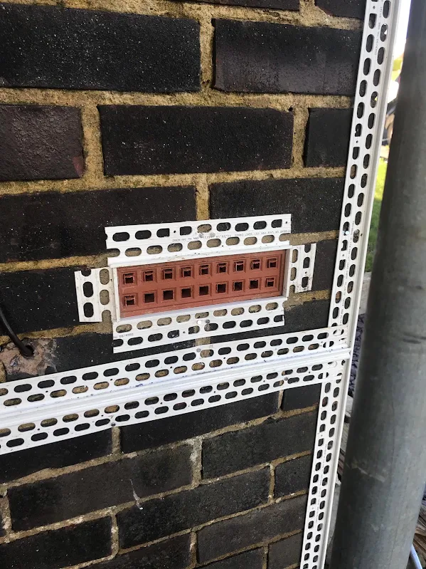 Render beads fixed to the brick