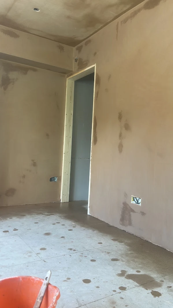 A skimmed room with a new doorway